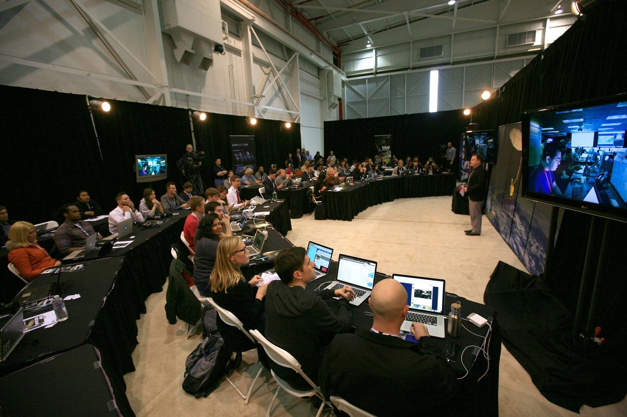 VANDENBERG AIR FORCE BASE, Calif. – Jason Townsend, NASA's deputy social media manager, addresses the audience of a NASA Social held at Vandenberg Air Force Base in California. This NASA Social brought together mission scientists and engineers with an audience of 70 students, educators, social media managers, bloggers, photographers and videographers who were selected from a pool of 325 applicants from 45 countries to participate in launch activities and communicate their experience with social media followers. The SMAP mission is scheduled to launch from Vandenberg on Jan. 29. To learn more about SMAP, visit http://www.nasa.gov/smap.  Photo credit: NASA/Kim Shiflett