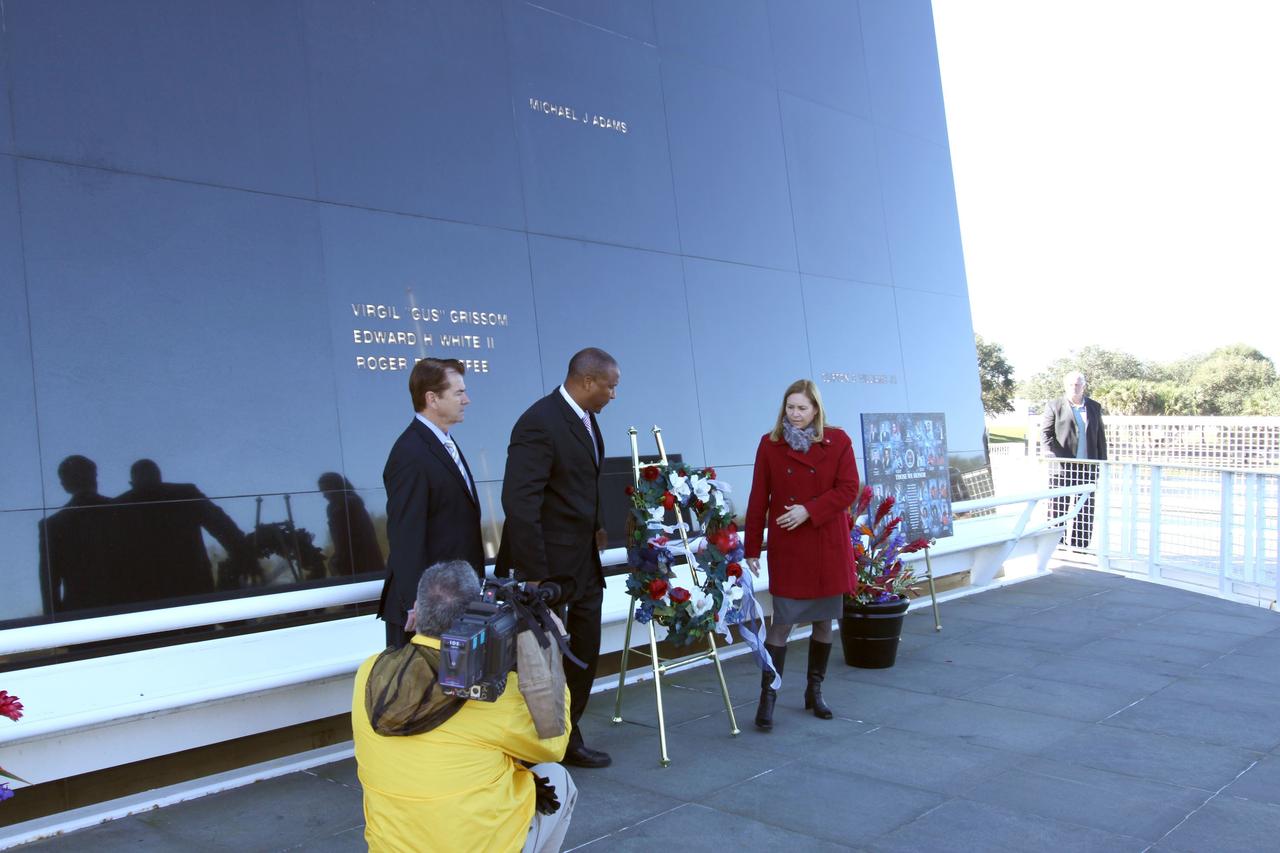 CAPE CANAVERAL, Fla. – NASA’s Kennedy Space Center in Florida paid tribute to the crews of Apollo 1 and space shuttles Challenger and Columbia, as well as other NASA astronauts who lost their lives while furthering the cause of exploration and discovery, during the agency's Day of Remembrance, Jan. 28.  From left, President and Chief Executive Officer of The Astronauts Memorial Foundation Thad Altman, Kennedy Associate Director Kelvin Manning, and Kennedy Deputy Director Janet Petro, participated in a wreath-laying ceremony at the Space Mirror Memorial located in the Kennedy Space Center Visitor Complex.