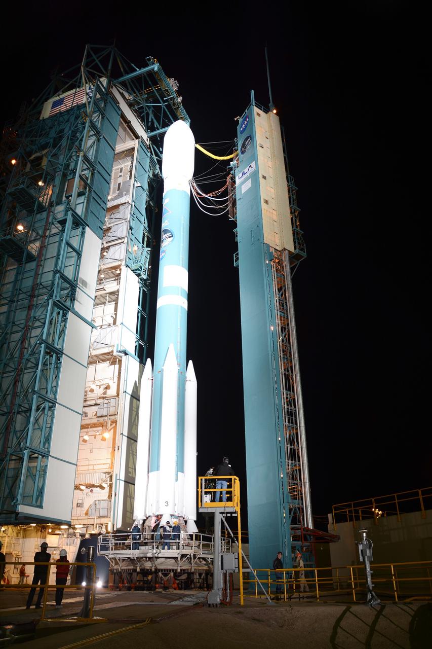 VANDENBERG AIR FORCE BASE, Calif. – The launch gantry is rolled back to reveal the United Launch Alliance Delta II rocket with the Soil Moisture Active Passive, or SMAP, satellite aboard, at Space Launch Complex 2 on Vandenberg Air Force Base in California. SMAP is a remote sensing mission designed to measure and map the Earth's soil moisture distribution and freeze/thaw stat with unprecedented accuracy, resolution and coverage. SMAP will provide global measurements of soil moisture and its freeze/thaw state. These measurements will be used to enhance understanding of processes that link the water, energy and carbon cycles, and to extend the capabilities of weather and climate prediction models. SMAP data also will be used to quantify net carbon flux in boreal landscapes and to develop improved flood prediction and drought monitoring capabilities. Launch is scheduled for Jan. 29, 2015. To learn more about SMAP, visit http://www.nasa.gov/smap. Photo credit: NASA/Randy Beaudoin