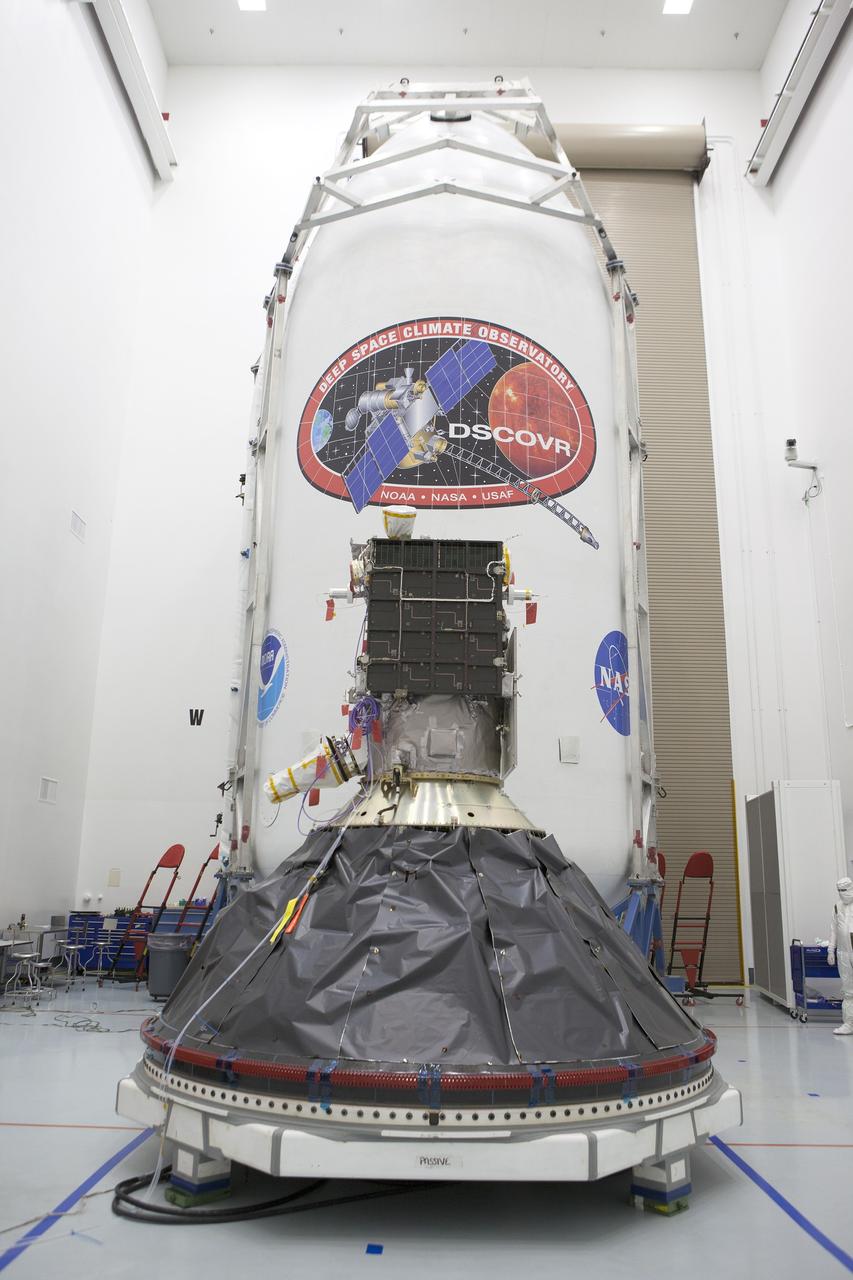 CAPE CANAVERAL, Fla. – Preparations to launch NOAA’s Deep Space Climate Observatory spacecraft, or DSCOVR, near completion in the Building 1 high bay of the Astrotech payload processing facility in Titusville, Florida, near Kennedy Space Center.    DSCOVR is a partnership between NOAA, NASA and the U.S. Air Force. DSCOVR will maintain the nation's real-time solar wind monitoring capabilities which are critical to the accuracy and lead time of NOAA's space weather alerts and forecasts. Launch is targeted for no earlier than Feb. 8 aboard a SpaceX Falcon 9 v 1.1 launch vehicle from Cape Canaveral Air Force Station, Florida. To learn more about DSCOVR, visit http://www.nesdis.noaa.gov/DSCOVR.  Photo credit: NASA/Kim Shiflett