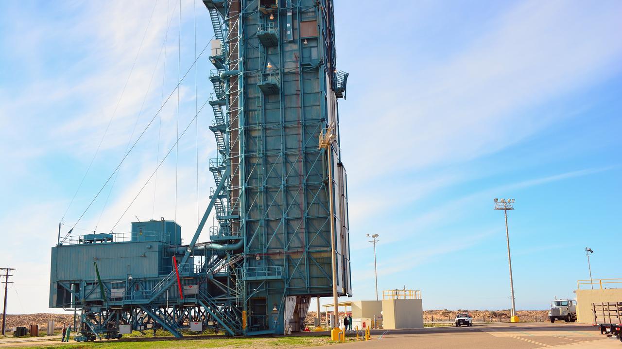 VANDENBERG AIR FORCE BASE, Calif. – Operations are underway at Space Launch Complex 2 on Vandenberg Air Force Base in California to enclose the United Launch Alliance Delta II rocket in the launch gantry. Aboard the rocket is NOAA's Soil Moisture Active Passive satellite, or SMAP, designed to produce the highest-resolution maps of soil moisture ever obtained from space. Launch was postponed today due to violation of upper-level wind shear constraints. Launch now is targeted for Jan. 31. To learn more about SMAP, visit http://www.nasa.gov/smap. Photo credit: NASA/Randy Beaudoin