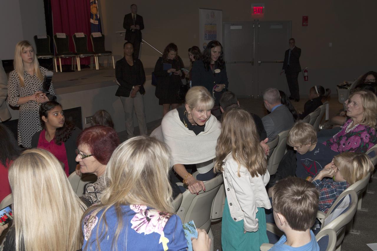 CAPE CANAVERAL, Fla. – First Lady of the State of Florida Ann Scott greets students inside the Astronaut Encounter Theater at NASA’s Kennedy Space Center in Florida during the 2015 Celebrate Literacy Week Florida PSA Awards program. The event, hosted by the Florida Department of Education, announced the winning entries from elementary, middle and high school students that best encouraged literacy and its connection to space careers. Photo credit: NASA/Ben Smegelsky