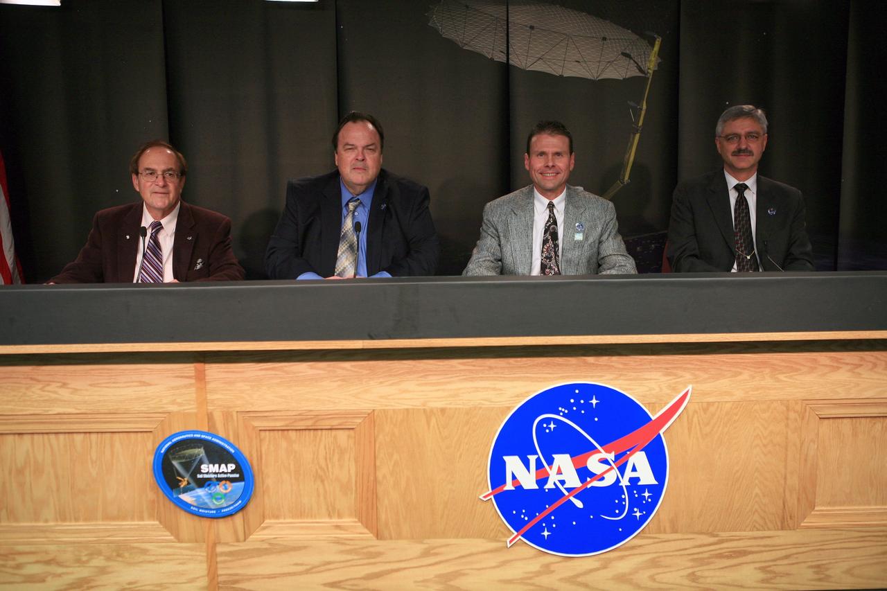 VANDENBERG AIR FORCE BASE, Calif. – During a news conference at Vandenberg Air Force Base in California, NASA officials discuss the launch of the Soil Moisture Active Passive satellite, or SMAP, and its mission to study the Earth's soil moisture. Participating in the briefing, from left, are George Diller of NASA Public Affairs, Kent Kellogg, SMAP project manager at the Jet Propulsion Laboratory in Pasadena, California, Scott Higginbotham, NASA mission manager for Educational Launch of Nanosatellites, or ELaNa-X, at the Kennedy Space Center, and Geoff Yoder, deputy associate administrator of the Science Mission Directorate at NASA Headquarters. To learn more about SMAP, visit http://www.nasa.gov/smap.  Photo credit: NASA/Kim Shiflett