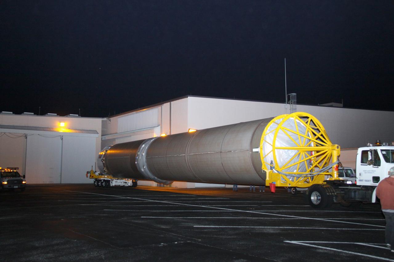 CAPE CANAVERAL, Fla. – The first stage of the United Launch Alliance Atlas V rocket for NASA's Magnetospheric Multiscale mission, or MMS, begins the short journey from the Atlas Spaceflight Operations Center, or ASOC, on Cape Canaveral Air Force Station in Florida to Space Launch Complex 41. MMS will study the mystery of how magnetic fields around Earth connect and disconnect, explosively releasing energy via a process known a magnetic reconnection. MMS consists of four identical spacecraft that work together to provide the first three-dimensional view of this fundamental process, which occurs throughout the universe.  Launch is set for March 12. To learn more about MMS, visit http://www.nasa.gov/mms.  Photo credit: NASA/Jim Grossmann