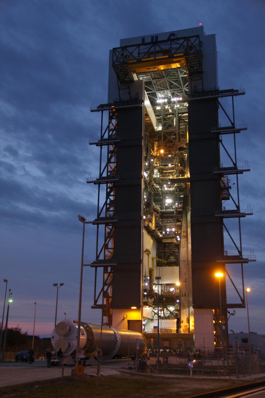 CAPE CANAVERAL, Fla. – The first stage of the United Launch Alliance Atlas V rocket for NASA's Magnetospheric Multiscale mission, or MMS, arrives at the mobile service tower at Space Launch Complex 41 on Cape Canaveral Air Force Station in Florida. MMS will study the mystery of how magnetic fields around Earth connect and disconnect, explosively releasing energy via a process known a magnetic reconnection. MMS consists of four identical spacecraft that work together to provide the first three-dimensional view of this fundamental process, which occurs throughout the universe.  Launch is set for March 12. To learn more about MMS, visit http://www.nasa.gov/mms.  Photo credit: NASA/Jim Grossmann