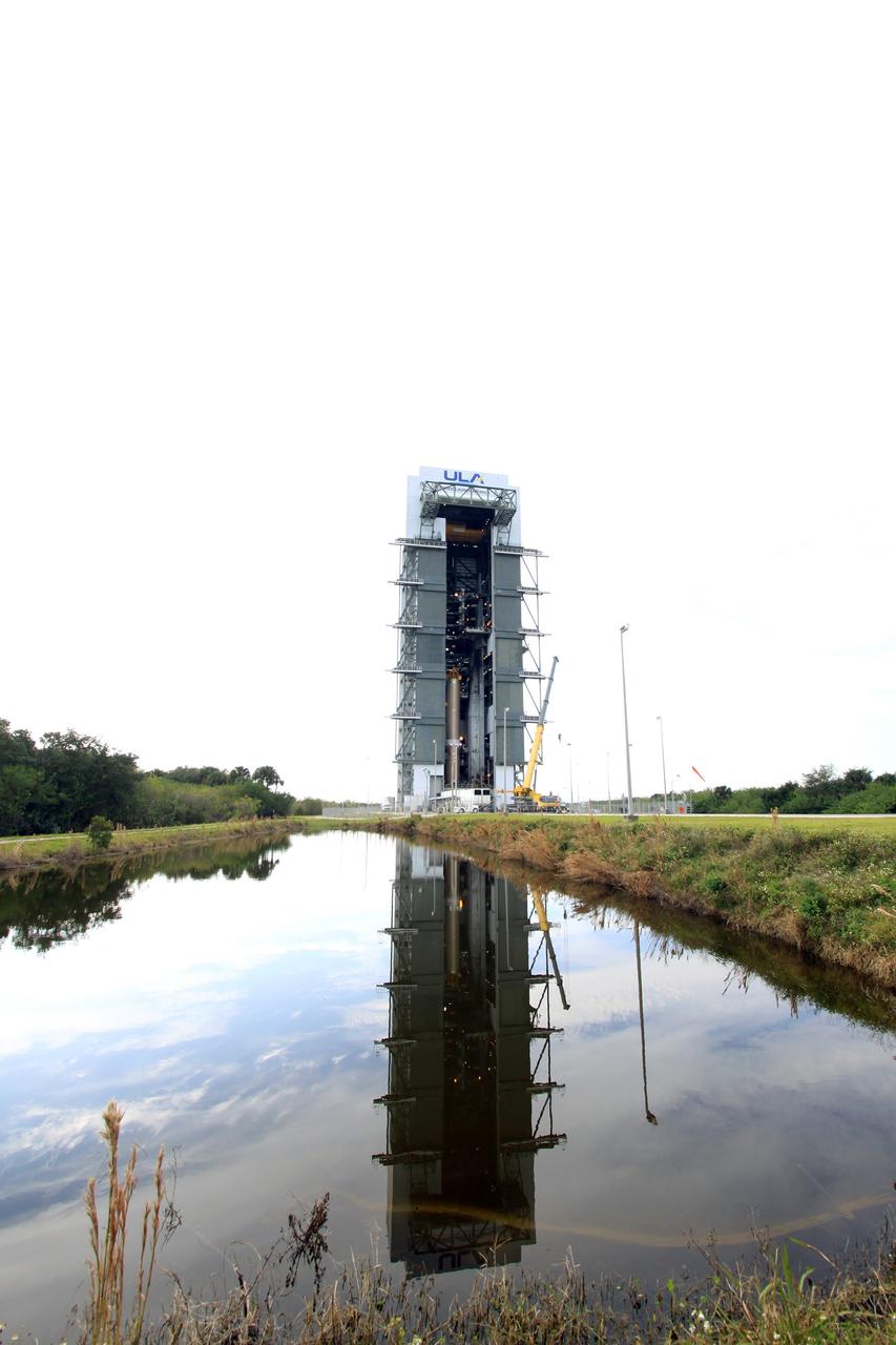 CAPE CANAVERAL, Fla. – The first stage of the United Launch Alliance Atlas V rocket for NASA's Magnetospheric Multiscale mission, or MMS, is in position on the launch platform in the mobile service tower at Space Launch Complex 41 on Cape Canaveral Air Force Station in Florida. MMS will study the mystery of how magnetic fields around Earth connect and disconnect, explosively releasing energy via a process known a magnetic reconnection. MMS consists of four identical spacecraft that work together to provide the first three-dimensional view of this fundamental process, which occurs throughout the universe.  Launch is set for March 12. To learn more about MMS, visit http://www.nasa.gov/mms.  Photo credit: NASA/Jim Grossmann