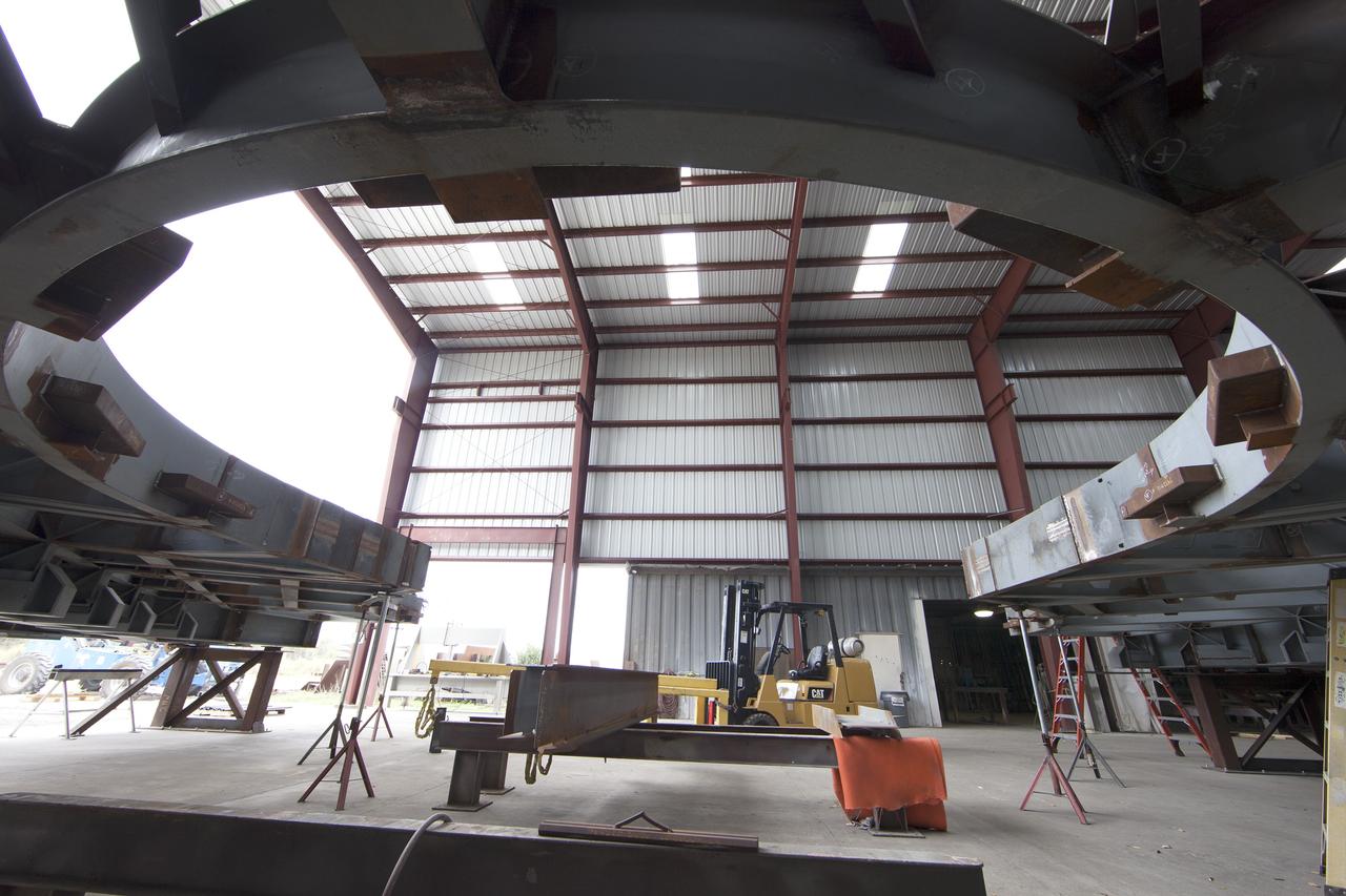 A view looking up reveals the buildup of the first of 10 new work platforms at Sauer Co. in Oak Hill, Florida. When completed, the first platform will be delivered for installation in high bay 3 of the Vehicle Assembly Building at NASA's Kennedy Space Center in Florida. A contract to modify high bay 3 was awarded by NASA to the Hensel Phelps Construction Co. of Orlando, Florida in March 2014. Sauer is a subcontractor to Hensel Phelps. The Ground Systems Development and Operations Program is overseeing upgrades and modifications to the high bay to support processing of NASA's Space Launch System and Orion spacecraft, and other exploration vehicles. Photo credit: NASA/Ben Smegelsky