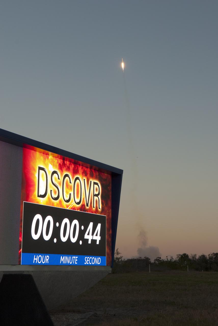 The SpaceX Falcon 9 rocket carrying NOAA’s Deep Space Climate Observatory spacecraft, or DSCOVR, rises in the background as the countdown clock at NASA’s Kennedy Space Center in Florida reads 44 seconds into flight. The Falcon 9 launched from Space Launch Complex 40 at Cape Canaveral Air Force Station at 6:03 p.m. EST. DSCOVR is a partnership between NOAA, NASA and the U.S. Air Force, and will maintain the nation's real-time solar wind monitoring capabilities. To learn more about DSCOVR, visit http://www.nesdis.noaa.gov/DSCOVR. Photo credit: NASA/Frankie Martin