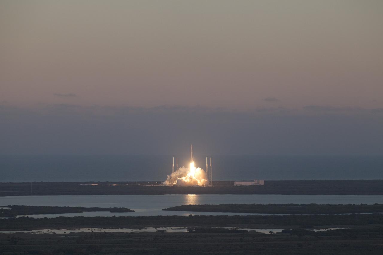 Sunset colors the horizon to the east as the SpaceX Falcon 9 rocket climbs away from Space Launch Complex 40 at Florida’s Cape Canaveral Air Force Station. On board is NOAA’s Deep Space Climate Observatory spacecraft, or DSCOVR. Liftoff occurred at 6:03 p.m. EST. DSCOVR is a partnership between NOAA, NASA and the U.S. Air Force, and will maintain the nation's real-time solar wind monitoring capabilities. To learn more about DSCOVR, visit http://www.nesdis.noaa.gov/DSCOVR.  Photo credit: NASA/Kim Shiflett