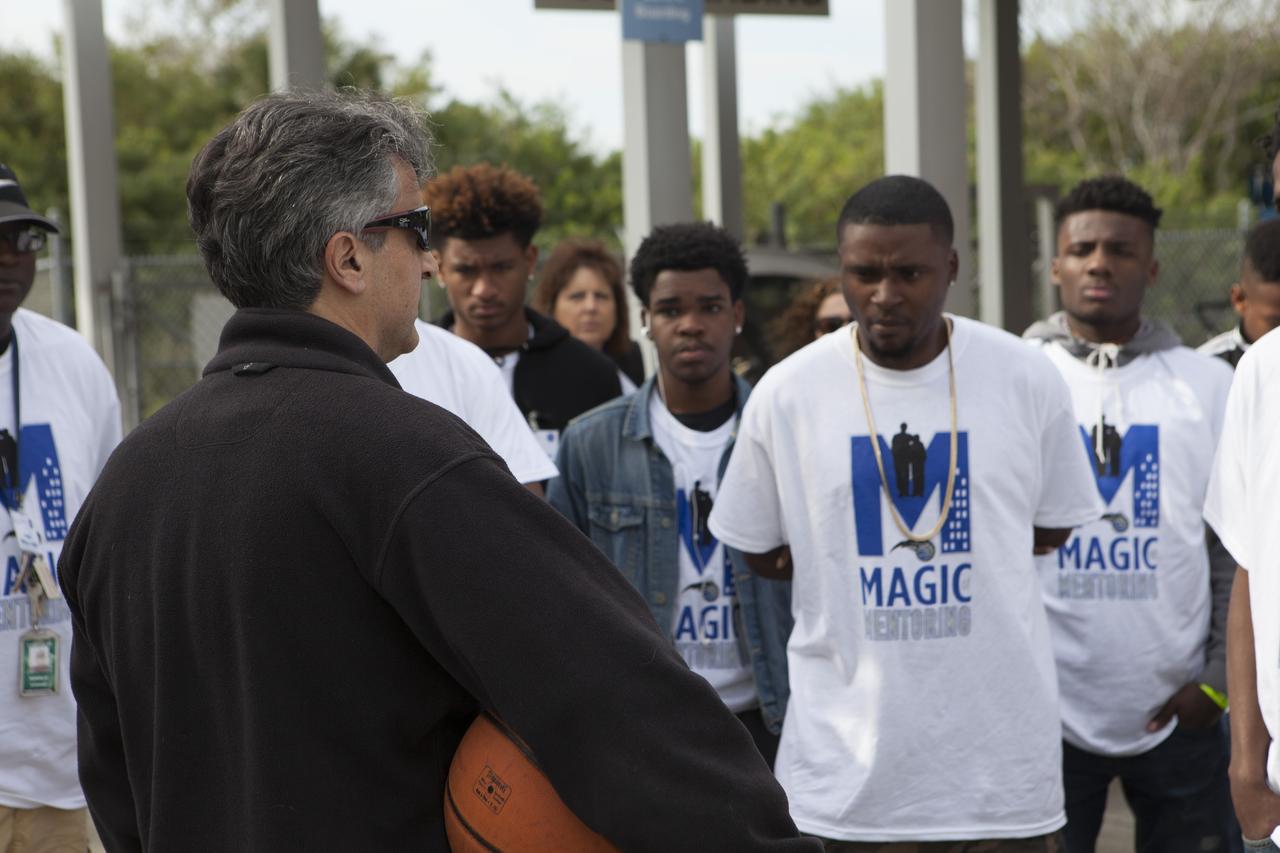 Jose Nunez of NASA Kennedy Space Center’s Exploration Research and Technology Programs talks to students in the My Brother’s Keeper program outside the Florida spaceport’s Swamp Works Lab.  Kennedy is one of six NASA centers that participated in My Brother’s Keeper National Lab Week. The event is a nationwide effort to bring youth from underrepresented communities into federal labs and centers for hands-on activities, tours and inspirational speakers. Sixty students from the nearby cities of Orlando and Sanford visited Kennedy, where they toured the Vehicle Assembly Building, the Space Station Processing Facility and the center’s innovative Swamp Works Labs. The students also had a chance to meet and ask questions of a panel of subject matter experts from across Kennedy. 