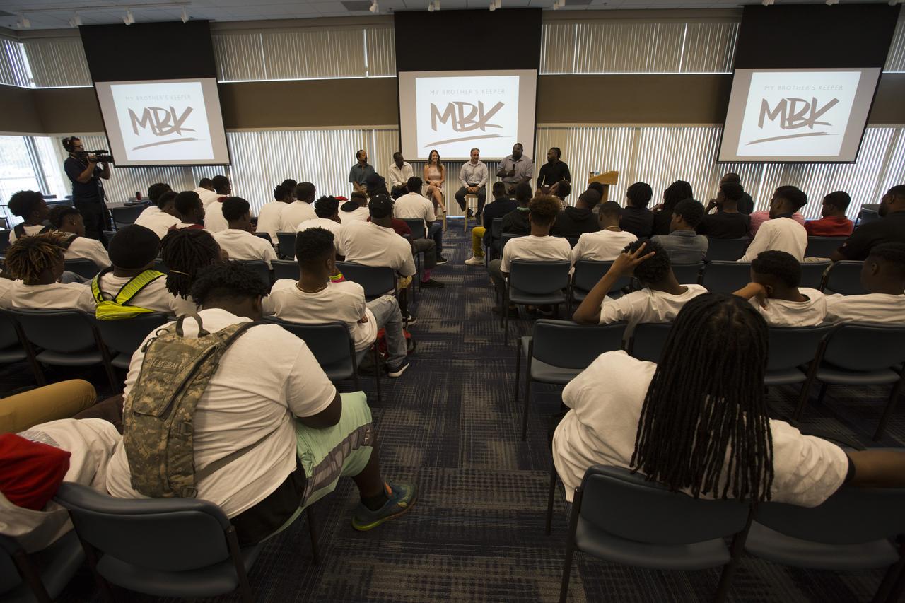 Students in the My Brother’s Keeper program hear from experts from across NASA’s Kennedy Space Center during a panel discussion in the Space Station Processing Facility Conference Center. Seated from left to right are Sheldon Lauderdale of the Commercial Crew Program (CCP); Yves Lamothe of the Ground Systems Development and Operations Program; Jennifer Levitt of CCP; Trent Smith and DeAntae Cooper (far right) of the Exploration Research and Technology Programs; and Malcolm Boston of the Launch Services Program. The spaceport is one of six NASA centers that participated in My Brother’s Keeper National Lab Week. The event is a nationwide effort to bring youth from underrepresented communities into federal labs and centers for hands-on activities, tours and inspirational speakers. 