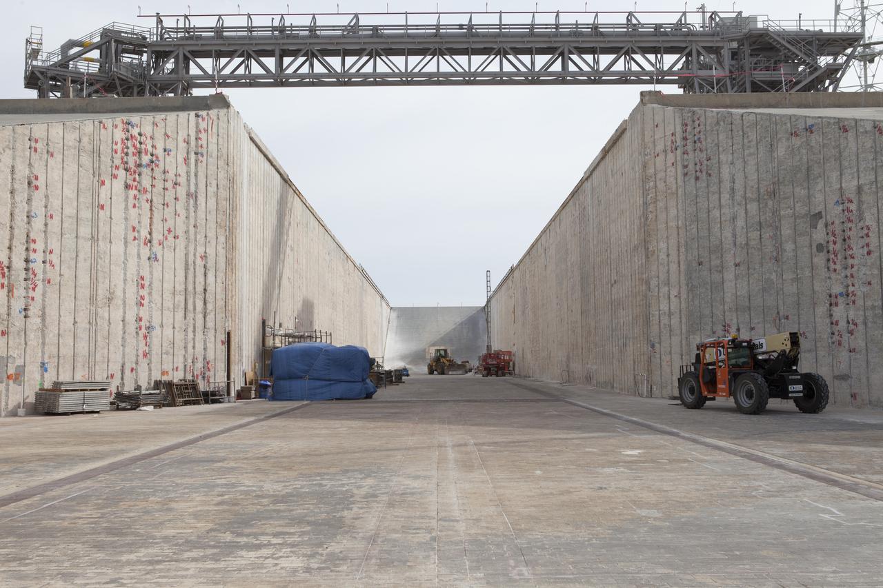 Upgrades and modifications continue to the flame trench at Launch Pad 39B at NASA’s Kennedy Space Center in Florida. Pad B is being refurbished to support the launch of NASA’s Space Launch System rocket. The Ground Systems Development and Operations (GSDO) Program at Kennedy is helping transform the space center into a multi-user spaceport and prepare for Exploration Mission-1, deep-space missions, and the journey to Mars.