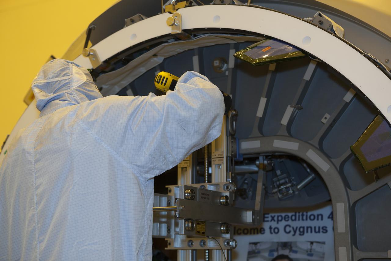 Inside the Payload Hazardous Servicing Facility at NASA's Kennedy Space Center in Florida, the hatch is closed for the upcoming flight of a Cygnus cargo vessel. The spacecraft is scheduled for the upcoming Orbital ATK Commercial Resupply Services-6 mission to deliver hardware and supplies to the International Space Station. The Cygnus is scheduled to lift off atop a United Launch Alliance Atlas V rocket on March 22.