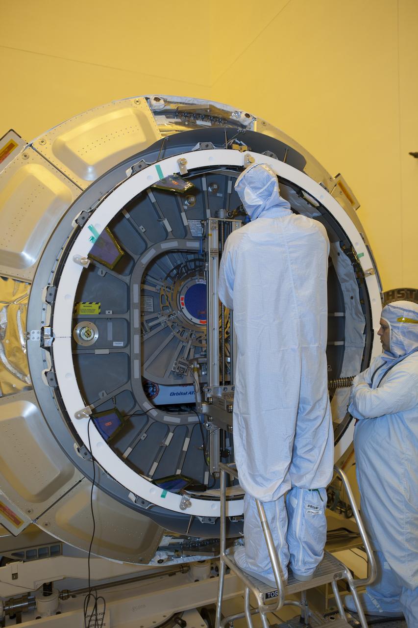 Inside the Payload Hazardous Servicing Facility at NASA's Kennedy Space Center in Florida, the hatch is closed for the upcoming flight of a Cygnus cargo vessel. The spacecraft is scheduled for the upcoming Orbital ATK Commercial Resupply Services-6 mission to deliver hardware and supplies to the International Space Station. The Cygnus is scheduled to lift off atop a United Launch Alliance Atlas V rocket on March 22.