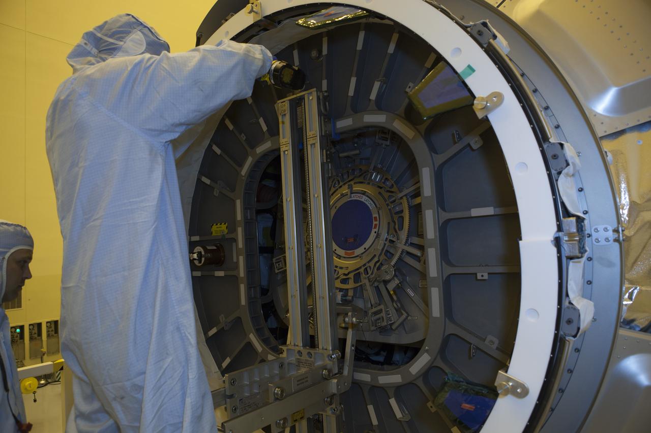 Inside the Payload Hazardous Servicing Facility at NASA's Kennedy Space Center in Florida, the hatch is closed for the upcoming flight of a Cygnus cargo vessel. The spacecraft is scheduled for the upcoming Orbital ATK Commercial Resupply Services-6 mission to deliver hardware and supplies to the International Space Station. The Cygnus is scheduled to lift off atop a United Launch Alliance Atlas V rocket on March 22.