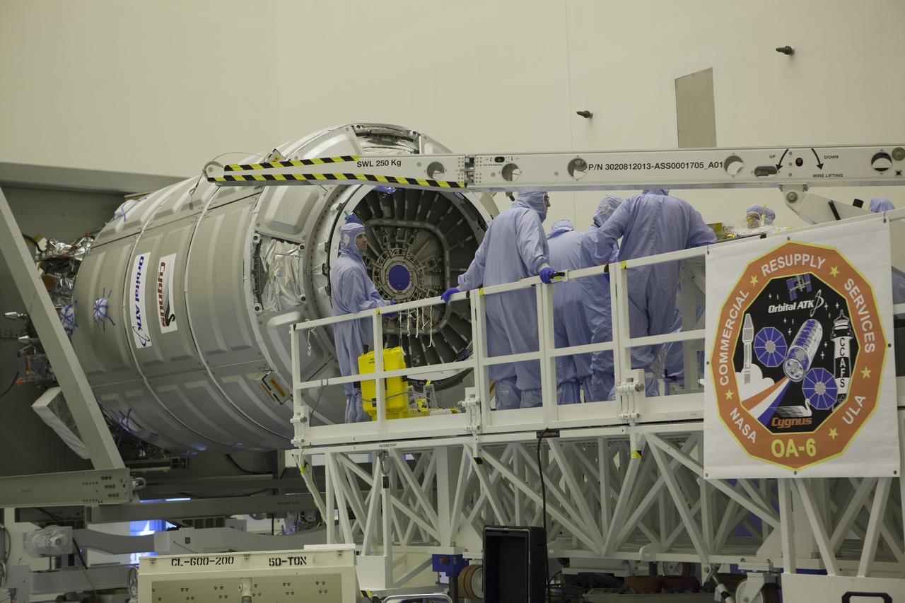 Inside the Payload Hazardous Servicing Facility at NASA's Kennedy Space Center in Florida, the hatch is closed for the upcoming flight of a Cygnus cargo vessel. The spacecraft is scheduled for the upcoming Orbital ATK Commercial Resupply Services-6 mission to deliver hardware and supplies to the International Space Station. The Cygnus is scheduled to lift off atop a United Launch Alliance Atlas V rocket on March 22.