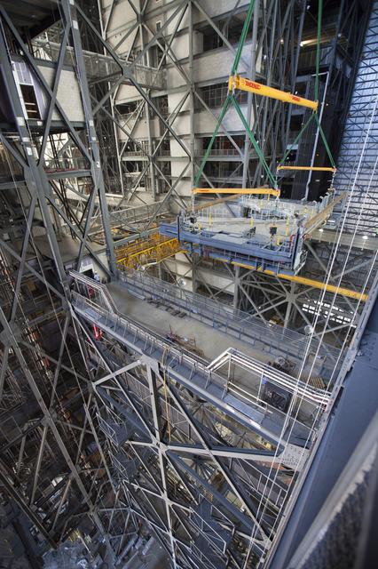 NASA image: VAB Platform K(2) Lift & Install into Highbay 3