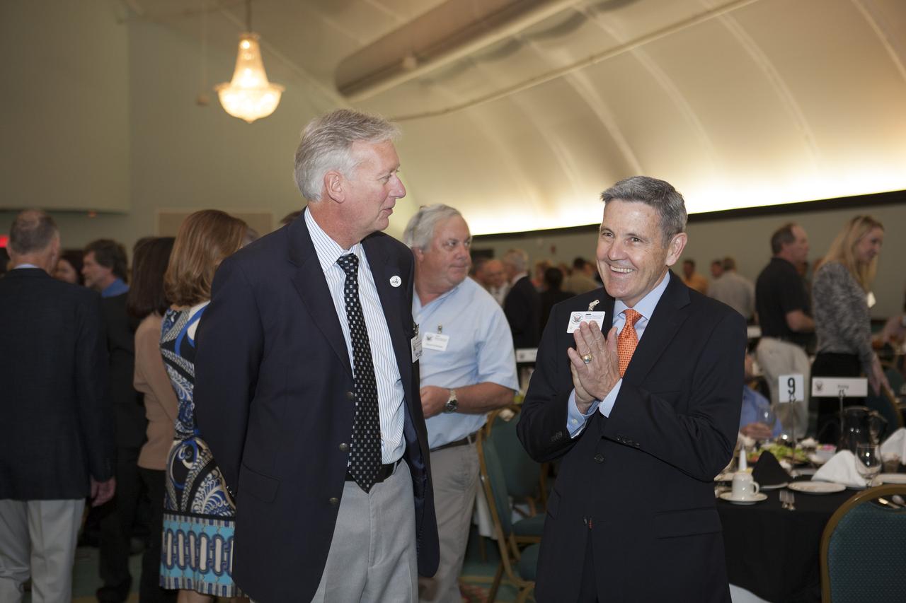 Bob Cabana, right, director of NASA's Kennedy Space Center in Florida, in discussion with a member of the National Space Club Florida Committee during the organization's luncheon in Cape Canaveral. Cabana, a former astronaut, was the keynote speaker for the luncheon and delivered an update on Kennedy's future as the premier launch center for NASA and other users.