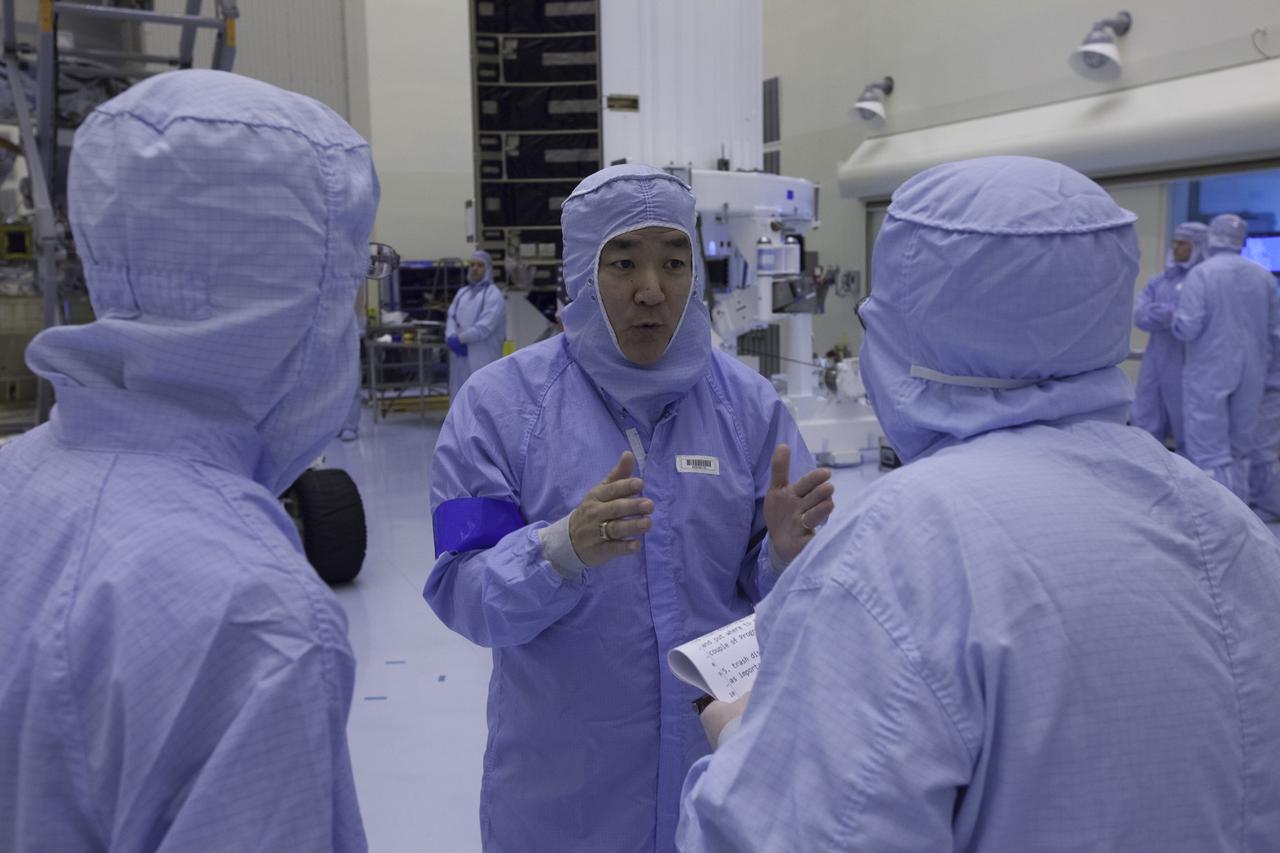 Inside the Payload Hazardous Servicing Facility at NASA's Kennedy Space Center, former NASA astronaut Dan Tani, who now is senior director of Missions and Cargo Operations for Orbital ATK in Dulles, Virginia, participates in a press interview. In the background is the Cygnus spacecraft scheduled to deliver hardware and supplies to the International Space Station on the upcoming Orbital ATK Commercial Resupply Services-6 mission.