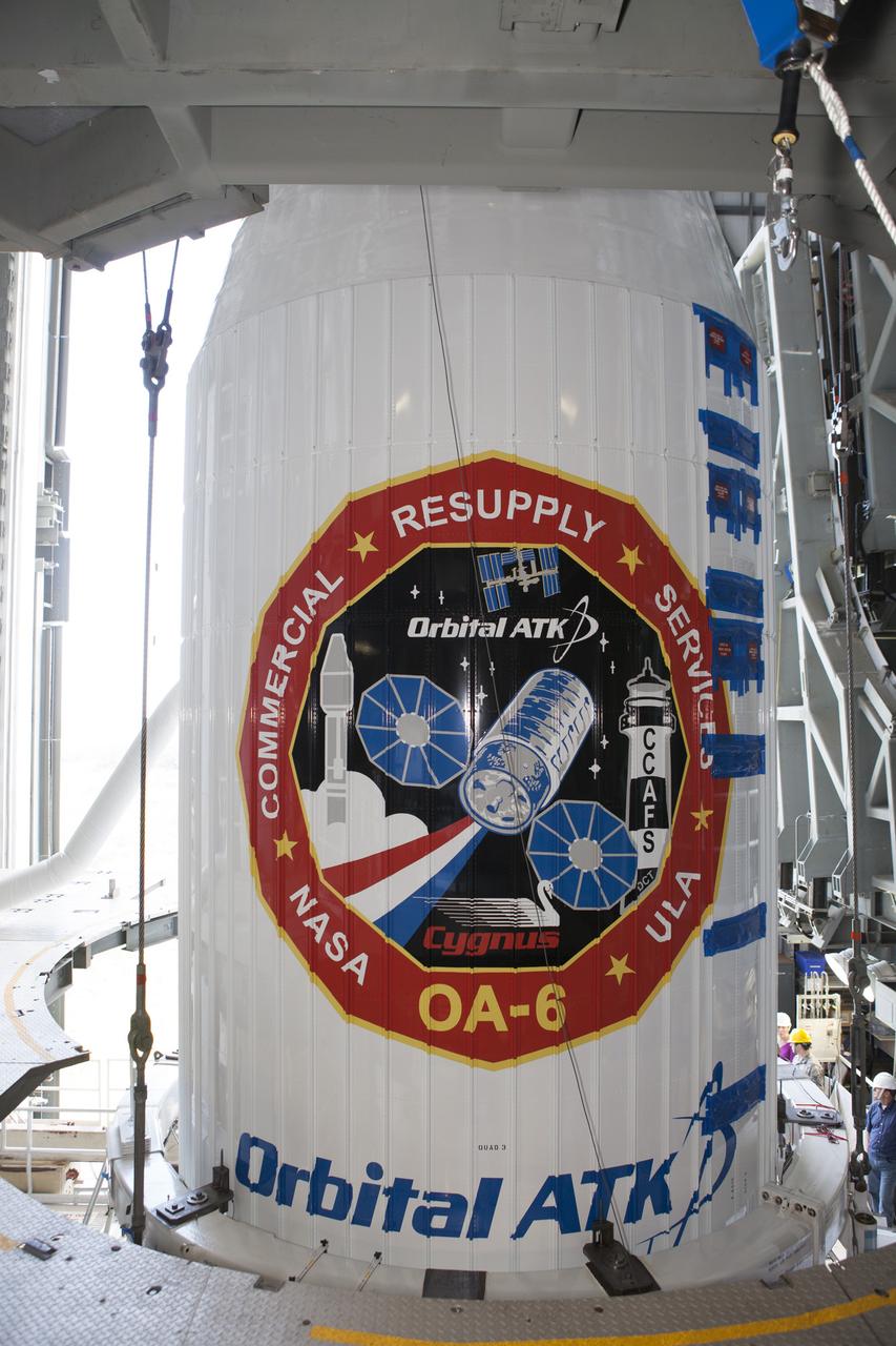 Encapsulated inside its payload fairing, the Cygnus spacecraft for the upcoming Orbital ATK Commercial Resupply Services-6 is mated atop a United Launch Alliance Atlas V rocket in the Vertical Integration Facility at Launch Complex-41 at Cape Canaveral Air Force Station. The Cygnus is scheduled to lift off atop a United Launch Alliance Atlas V rocket on March 22 to deliver hardware and supplies to the International Space Station.