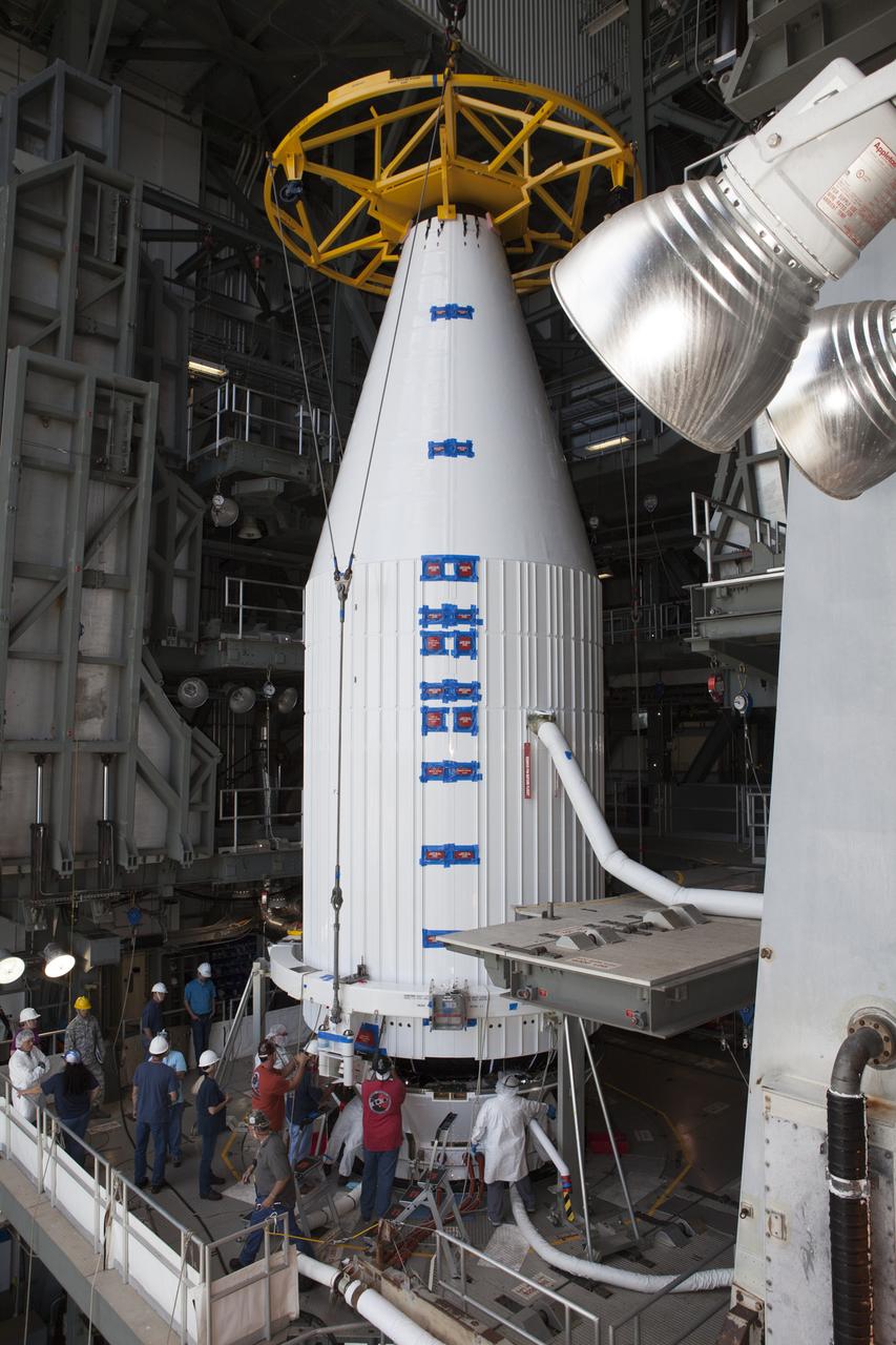 Encapsulated inside its payload fairing, the Cygnus spacecraft for the upcoming Orbital ATK Commercial Resupply Services-6 is mated atop a United Launch Alliance Atlas V rocket in the Vertical Integration Facility at Launch Complex-41 at Cape Canaveral Air Force Station. The Cygnus is scheduled to lift off atop a United Launch Alliance Atlas V rocket on March 22 to deliver hardware and supplies to the International Space Station.