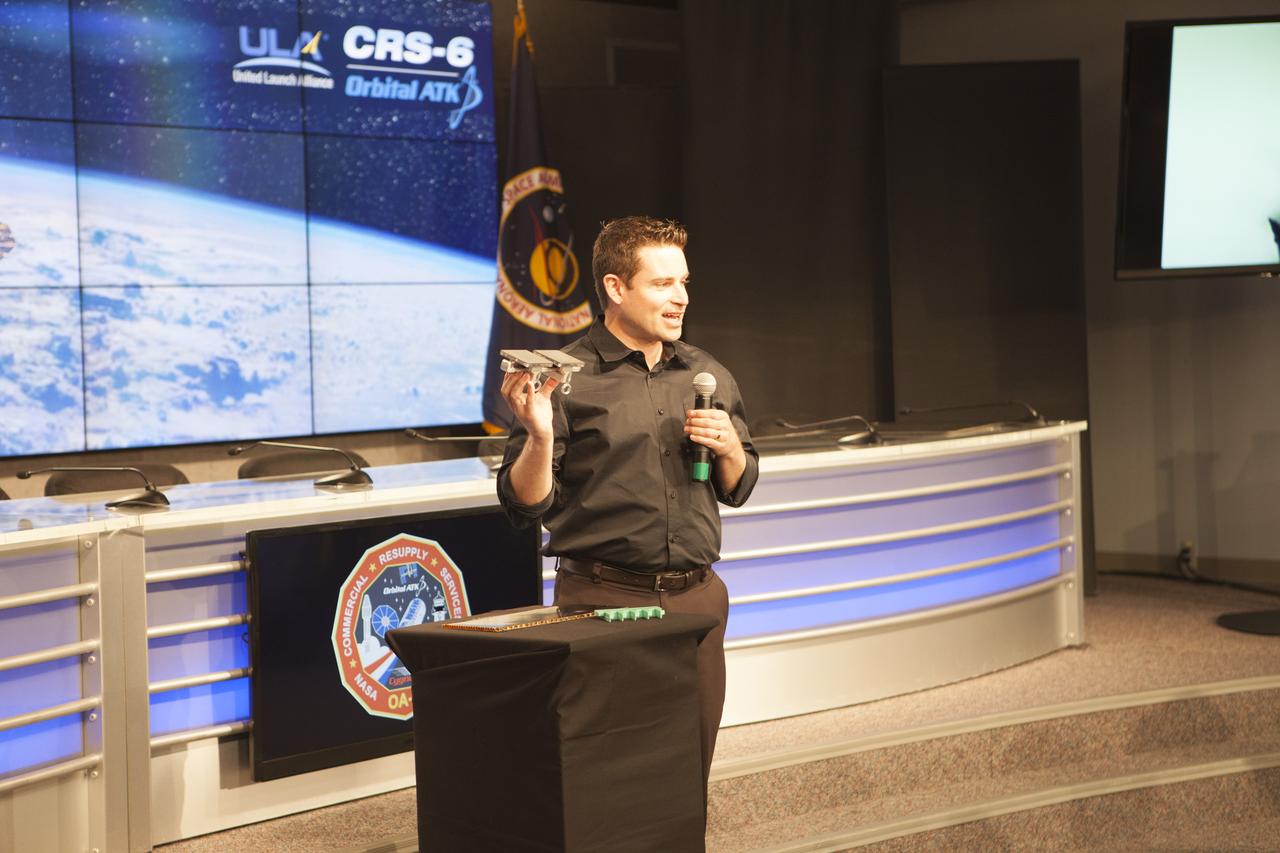 Dr. Aaron Parness, group leader at the Jet Propulsion Laboratory in Pasadena, California, who is working the Extreme Environment Robots Group on the Gecko Grippers experiment, speaks to members of the media in the Kennedy Space Center’s Press Site auditorium. The briefing focused on science research and technology work planned for the International Space Station, or ISS, following the arrival of a Cygnus spacecraft. The Cygnus is scheduled to be launched March 22 atop a United Launch Alliance Atlas V rocket on the Orbital ATK CRS-6 commercial resupply services mission.