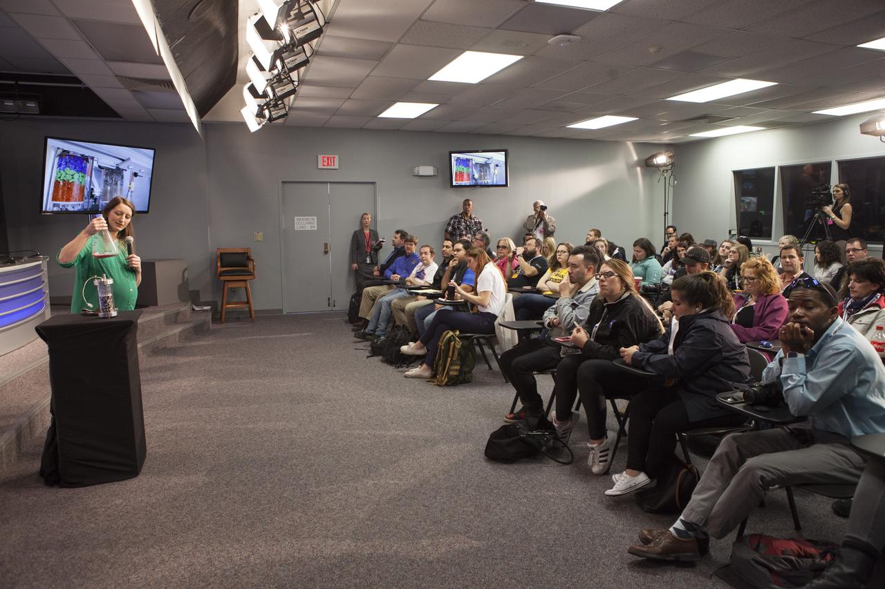 Dr. Kristen John, deputy project manager and co-investigator for the Strata-1 experiment at the Johnson Space Center in Houston , speaks to members of the media in the Kennedy Space Center’s Press Site auditorium. The briefing focused on science research and technology work planned for the International Space Station, or ISS, following the arrival of a Cygnus spacecraft. The Cygnus is scheduled to be launched March 22 atop a United Launch Alliance Atlas V rocket on the Orbital ATK CRS-6 commercial resupply services mission.
