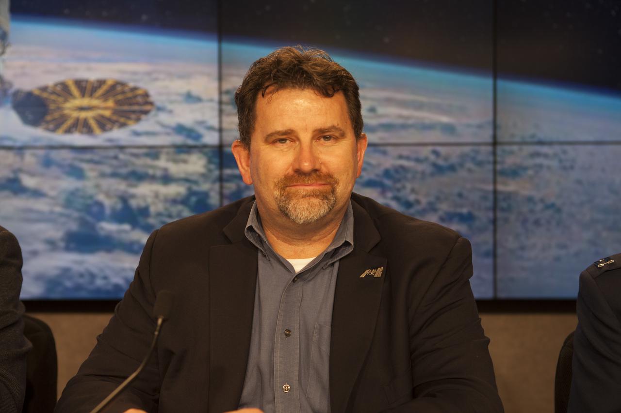 In the Kennedy Space Center’s Press Site auditorium, Dr. Michael Roberts deputy chief scientist for the Center for the Advancement for Science in Space, or CASIS, speaks to members of the media at a prelaunch news conference for Orbital ATK CRS-6 commercial resupply services mission to the International Space Station. 