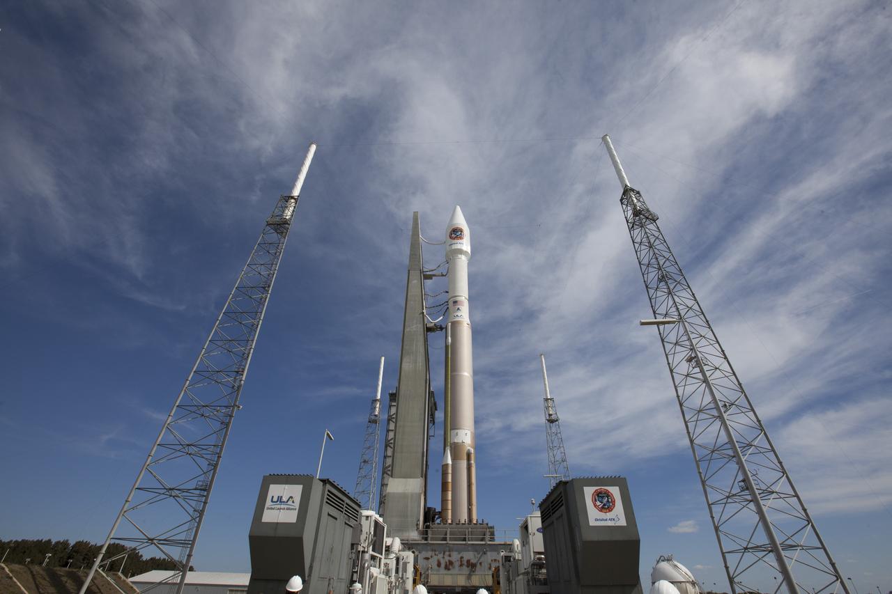 A United Launch Alliance Atlas V rocket is moved from the Vertical Integration Facility to the launch pad at Cape Canaveral Air Force Station's Space Launch Complex 41. A Cygnus spacecraft is scheduled to deliver 7,700 pounds of supplies and research experiments on the Orbital ATK CRS-6 mission to the International Space Station.