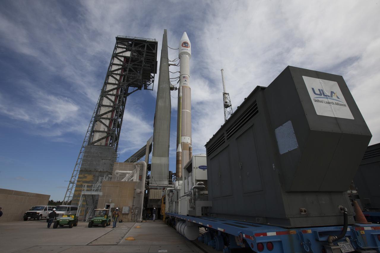 A United Launch Alliance Atlas V rocket arrives at the launch pad at Cape Canaveral Air Force Station's Space Launch Complex 41. A Cygnus spacecraft is scheduled to deliver 7,700 pounds of supplies and research experiments on the Orbital ATK CRS-6 mission to the International Space Station.