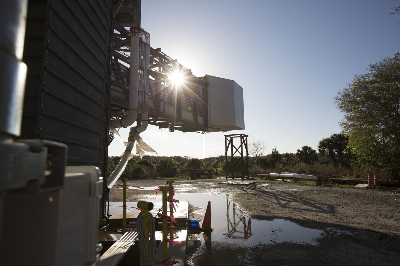The Crew Access Arm is seen following a water deluge systems test March 23 at a construction yard near NASA's Kennedy Space Center in Florida. The arm is being tested before being installed on Space Launch Complex 41 Crew Access Tower later this year. It will be used as a bridge by astronauts to board Boeing's CST-100 Starliner spacecraft as it stands on the launch pad atop a United Launch Alliance Atlas V rocket. 