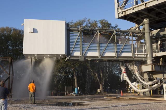 NASA image: CCP Boeing/ULA Crew Access Arm Emergency Evacuation Water Test