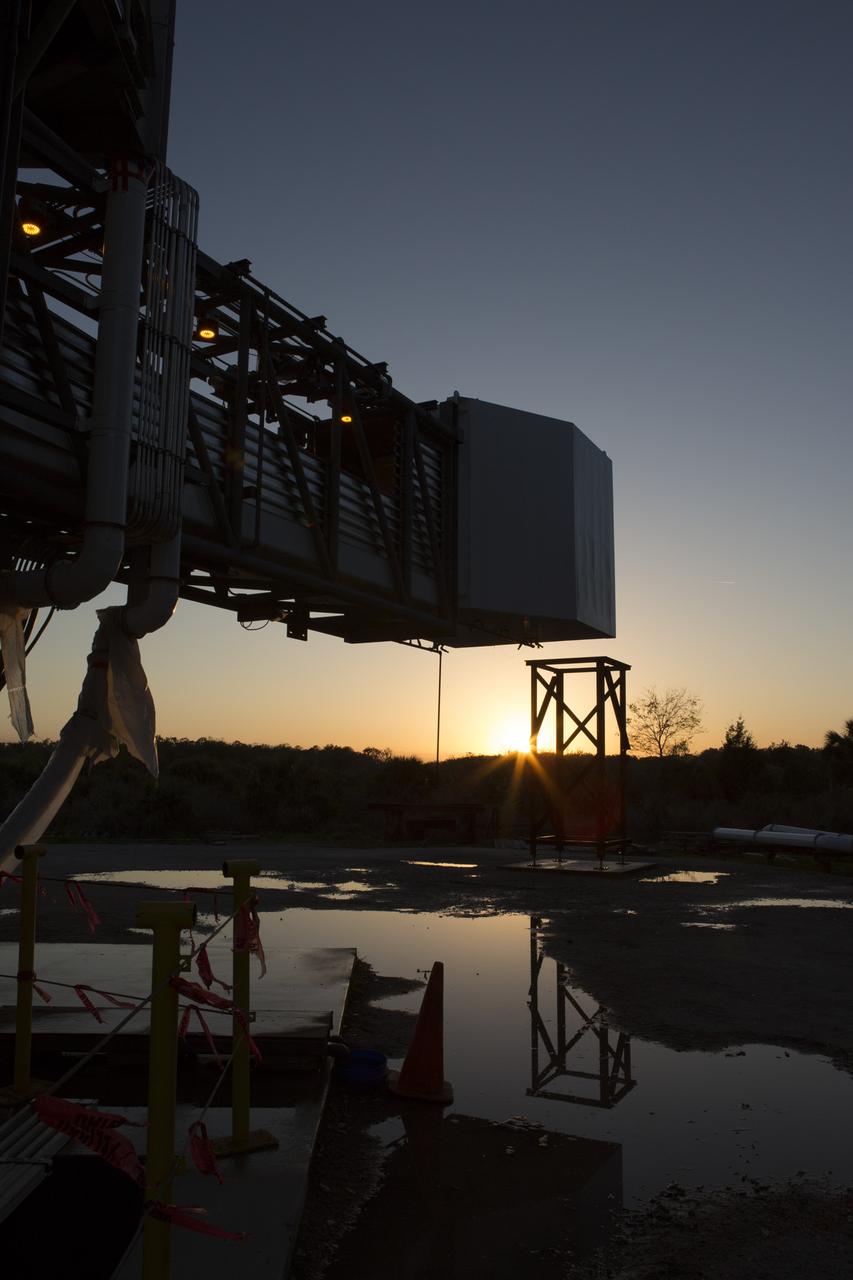 The Crew Access Arm is seen following a water deluge systems test March 23 at a construction yard near NASA's Kennedy Space Center in Florida. The arm is being tested before being installed on Space Launch Complex 41 Crew Access Tower later this year. It will be used as a bridge by astronauts to board Boeing's CST-100 Starliner spacecraft as it stands on the launch pad atop a United Launch Alliance Atlas V rocket.