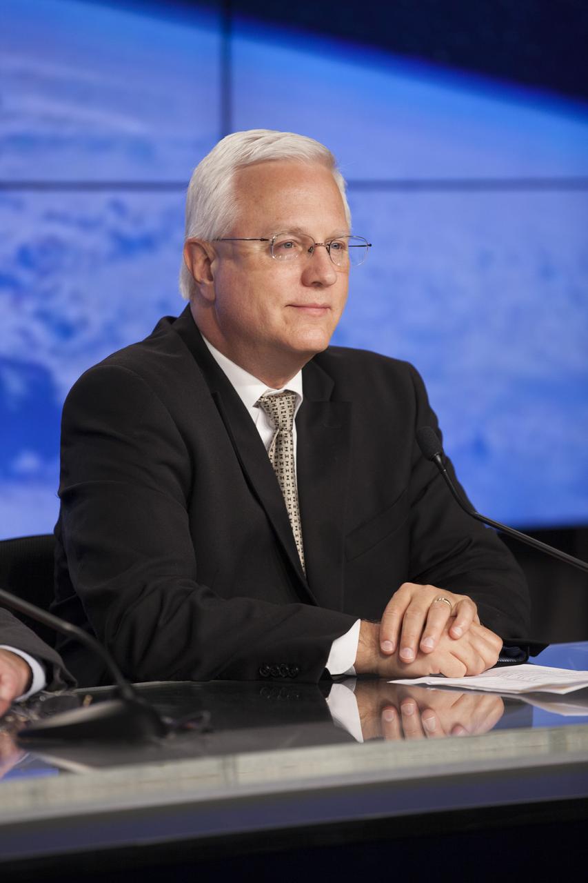 In the Press Site auditorium of NASA's Kennedy Space Center in Florida, Vern Thorp, United Space Alliance's program manager for NASA missions, speaks to members of the news media at a post-launch news conference following the liftoff of Orbital ATK CRS-6, a commercial resupply services mission to the International Space Station, or ISS. The Cygnus spacecraft lifted off atop an Atlas V rocket from Space Launch Complex 41 at Cape Canaveral Air Force Station at 11:05 p.m. EDT.