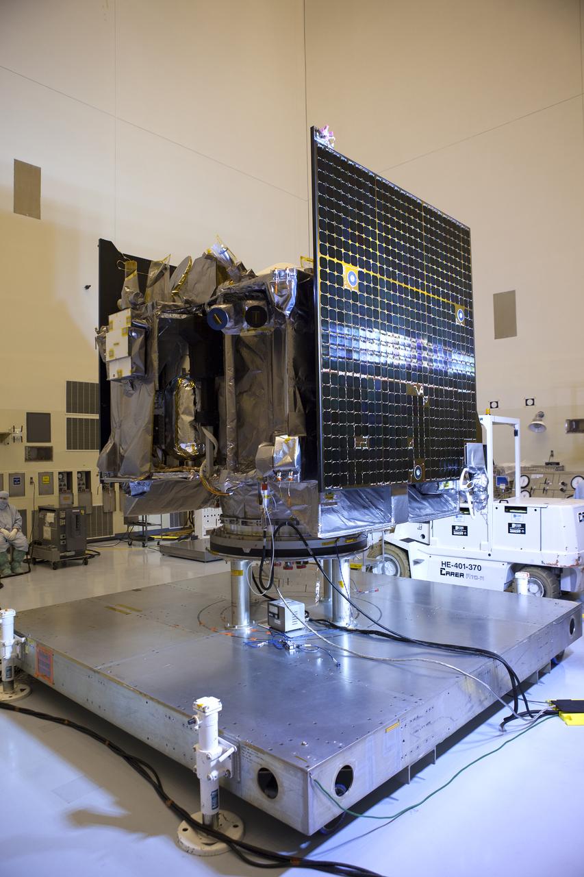 Inside the Payload Hazardous Servicing Facility at NASA's Kennedy Space Center in Florida, illumination testing is underway on the power-producing solar arrays for the agency’s Origins, Spectral Interpretation, Resource Identification, Security-Regolith Explorer, or OSIRIS-REx spacecraft. Targeted for liftoff Sept. 8, 2016, OSIRIS-Rex will be the first U.S. mission to sample an asteroid, retrieve at least two ounces of surface material and return it to Earth for study. The asteroid, Bennu, may hold clues to the origin of the solar system and the source of water and organic molecules found on Earth.