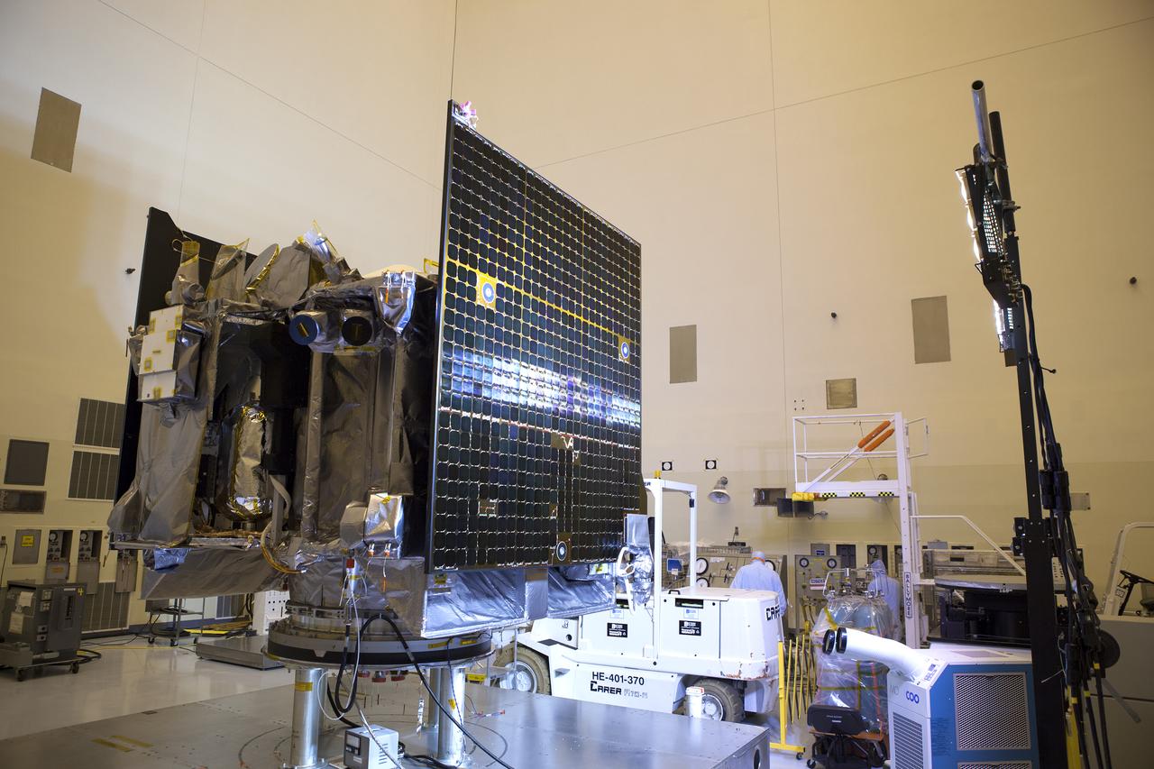 Inside the Payload Hazardous Servicing Facility at NASA's Kennedy Space Center in Florida, illumination testing is underway on the power-producing solar arrays for the agency’s Origins, Spectral Interpretation, Resource Identification, Security-Regolith Explorer, or OSIRIS-REx spacecraft. Targeted for liftoff Sept. 8, 2016, OSIRIS-Rex will be the first U.S. mission to sample an asteroid, retrieve at least two ounces of surface material and return it to Earth for study. The asteroid, Bennu, may hold clues to the origin of the solar system and the source of water and organic molecules found on Earth.