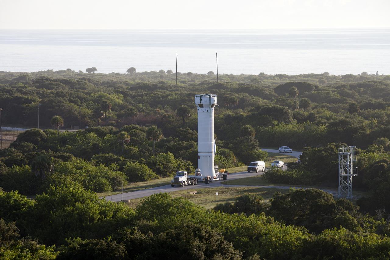 A Centaur upper stage, standing upright on a transporter, is driven to Space Launch Complex 41 on Florida’s Cape Canaveral Air Force Station, where it will be attached to the United Launch Alliance Atlas V rocket first stage booster. The rocket will boost NASA’s Origins, Spectral Interpretation, Resource Identification, Security-Regolith Explorer, or OSIRIS-REx spacecraft. Targeted for liftoff Sept. 8, 2016, OSIRIS-Rex will be the first U.S. mission to sample an asteroid, retrieve at least two ounces of surface material and return it to Earth for study. The asteroid, Bennu, may hold clues to the origin of the solar system and the source of water and organic molecules found on Earth.
