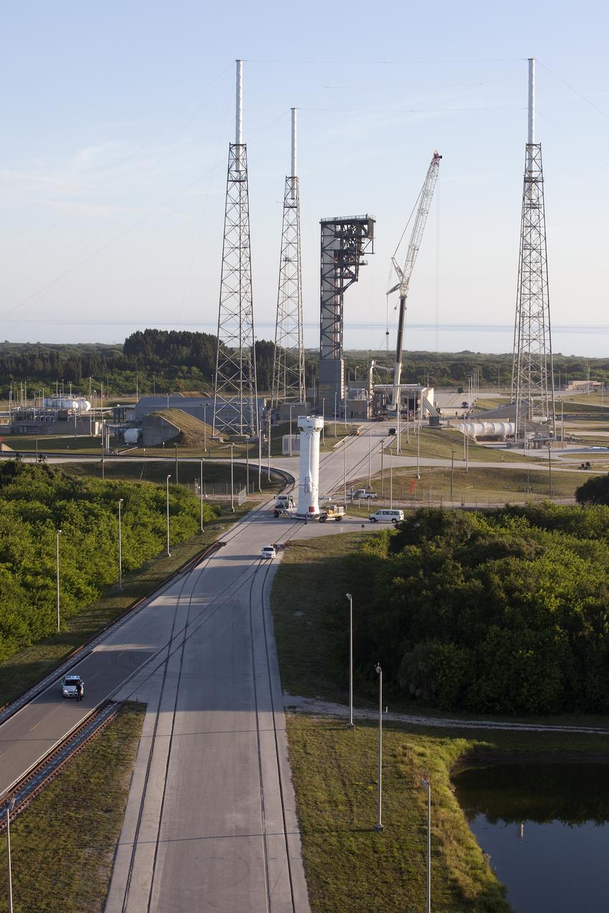 A Centaur upper stage, standing upright on a transporter, arrives at Space Launch Complex 41 on Florida’s Cape Canaveral Air Force Station, where it will be attached to the United Launch Alliance Atlas V rocket first stage booster. The rocket will boost NASA’s Origins, Spectral Interpretation, Resource Identification, Security-Regolith Explorer, or OSIRIS-REx spacecraft. Targeted for liftoff Sept. 8, 2016, OSIRIS-Rex will be the first U.S. mission to sample an asteroid, retrieve at least two ounces of surface material and return it to Earth for study. The asteroid, Bennu, may hold clues to the origin of the solar system and the source of water and organic molecules found on Earth.