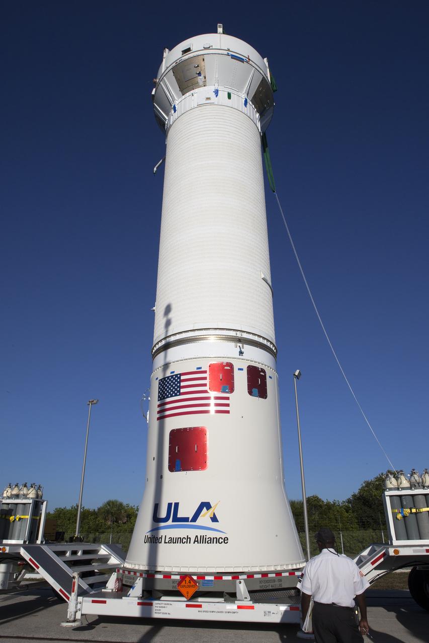 A Centaur upper stage, standing upright on a transporter, is prepared to be lifted and attached to the United Launch Alliance Atlas V rocket first stage booster at Space Launch Complex 41 on Florida’s Cape Canaveral Air Force Station. The rocket will boost NASA’s Origins, Spectral Interpretation, Resource Identification, Security-Regolith Explorer, or OSIRIS-REx spacecraft. Targeted for liftoff Sept. 8, 2016, OSIRIS-Rex will be the first U.S. mission to sample an asteroid, retrieve at least two ounces of surface material and return it to Earth for study. The asteroid, Bennu, may hold clues to the origin of the solar system and the source of water and organic molecules found on Earth.