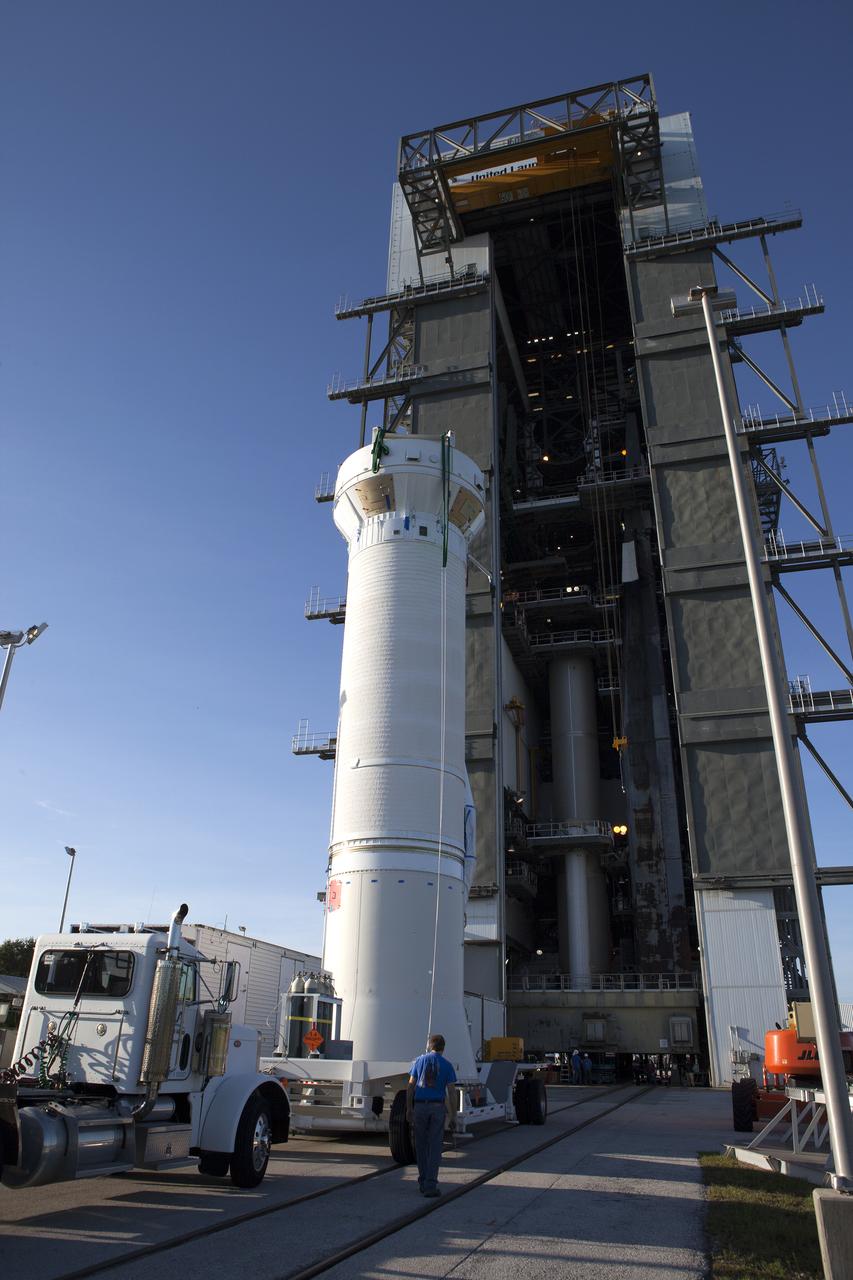 A Centaur upper stage, standing upright on a transporter, is prepared to be lifted and attached to the United Launch Alliance Atlas V rocket first stage booster at Space Launch Complex 41 on Florida’s Cape Canaveral Air Force Station. The rocket will boost NASA’s Origins, Spectral Interpretation, Resource Identification, Security-Regolith Explorer, or OSIRIS-REx spacecraft. Targeted for liftoff Sept. 8, 2016, OSIRIS-Rex will be the first U.S. mission to sample an asteroid, retrieve at least two ounces of surface material and return it to Earth for study. The asteroid, Bennu, may hold clues to the origin of the solar system and the source of water and organic molecules found on Earth.