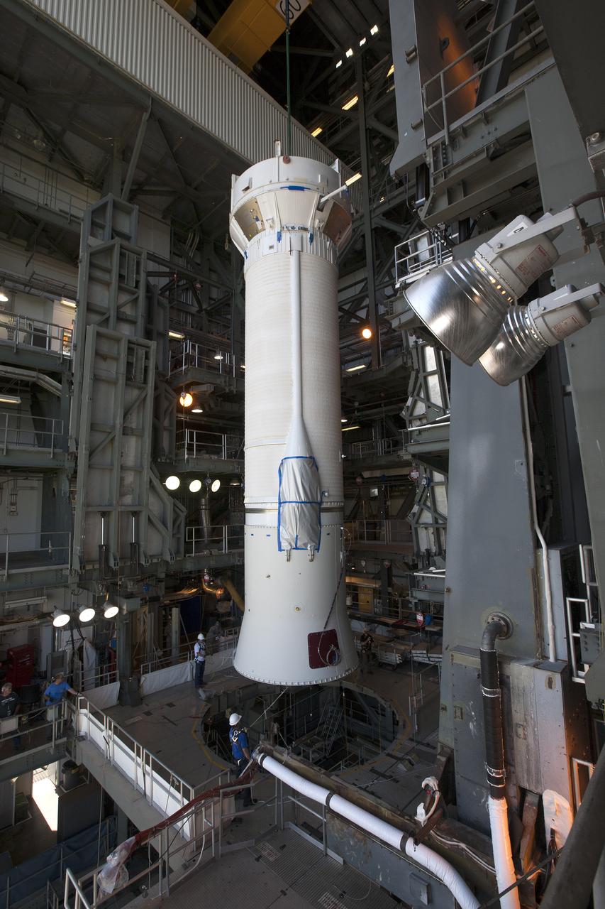 Team members prepare to attach a Centaur upper stage to the United Launch Alliance Atlas V rocket first stage booster at Space Launch Complex 41 on Florida’s Cape Canaveral Air Force Station. The rocket will boost NASA’s Origins, Spectral Interpretation, Resource Identification, Security-Regolith Explorer, or OSIRIS-REx spacecraft. Targeted for liftoff Sept. 8, 2016, OSIRIS-Rex will be the first U.S. mission to sample an asteroid, retrieve at least two ounces of surface material and return it to Earth for study. The asteroid, Bennu, may hold clues to the origin of the solar system and the source of water and organic molecules found on Earth. 