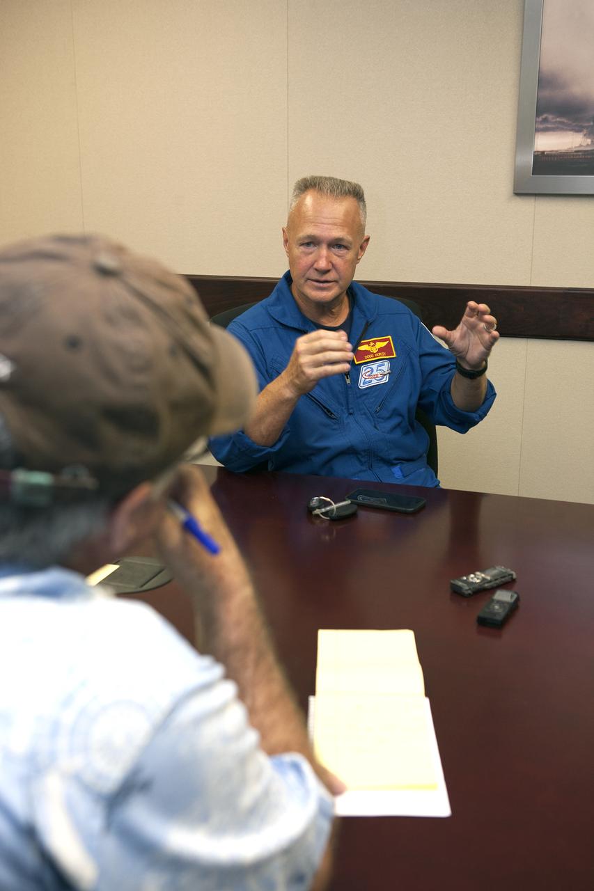 Astronauts selected to train for the flight tests of NASA’s Commercial Crew Program talked to members of the media at the News Center at NASA’s Kennedy Space Center in Florida. During the discussion, astronaut Doug Hurley answers a question.