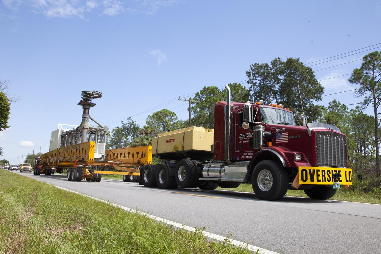 A heavy-lift transport truck, carrying the Crew Access Arm for Space Launch Complex 41, departs from Oak Hill, Florida, and heads to NASA’s Kennedy Space Center in Florida. The arm will be installed on the Complex 41 Crew Access Tower at Cape Canaveral Air Force Station. It will be used as a bridge by astronauts to board Boeing's CST-100 Starliner spacecraft as it stands on the launch pad atop a United Launch Alliance Atlas V rocket.