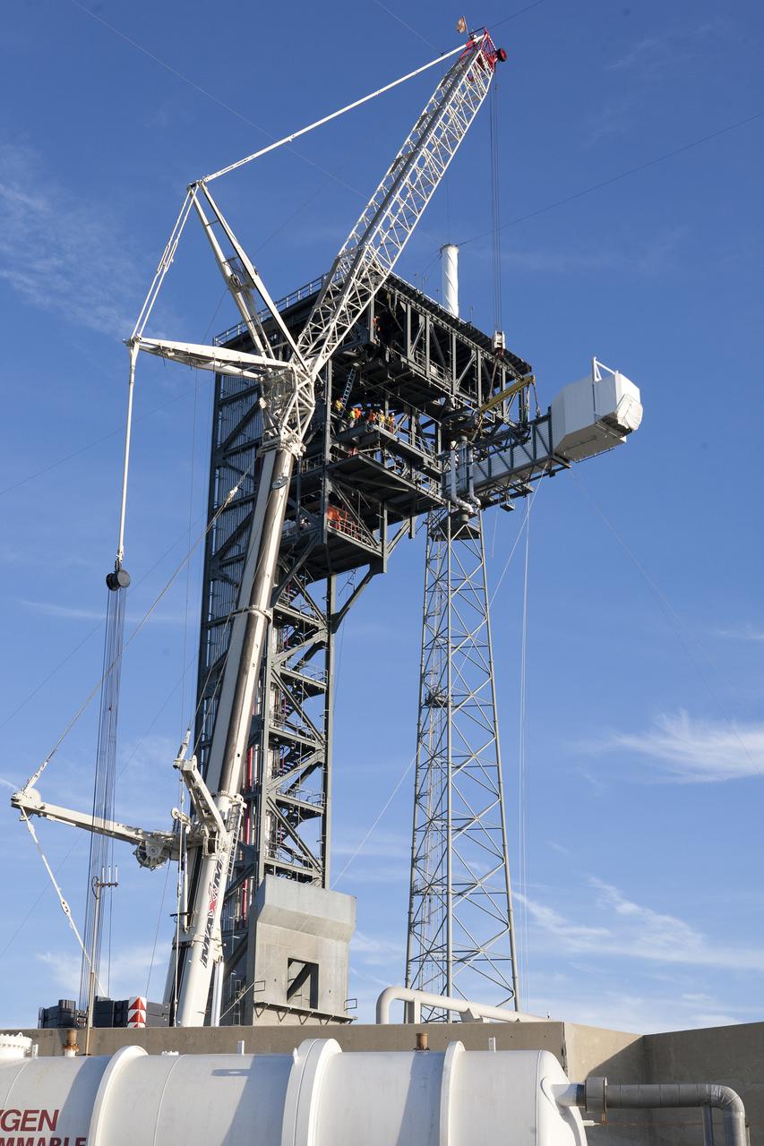 A crane lifts the Crew Access Arm and White Room for Boeing's CST-100 Starliner spacecraft to be attached to the Crew Access Tower at Cape Canaveral Air Force Station’s Space Launch Complex 41. When attached to the 200-foot tall Crew Access Tower, the arm will serve as the connection that astronauts will walk through prior to boarding the Starliner spacecraft when stacked atop a United Launch Alliance Atlas V rocket. This installation completes the major construction of the first new Crew Access Tower to be built at the Cape since the Apollo era. Under a Commercial Crew Transportation Capability (CCtCap) contract with NASA, Boeing’s Starliner system will be certified by NASA's Commercial Crew Program to fly crews to and from the International Space Station.