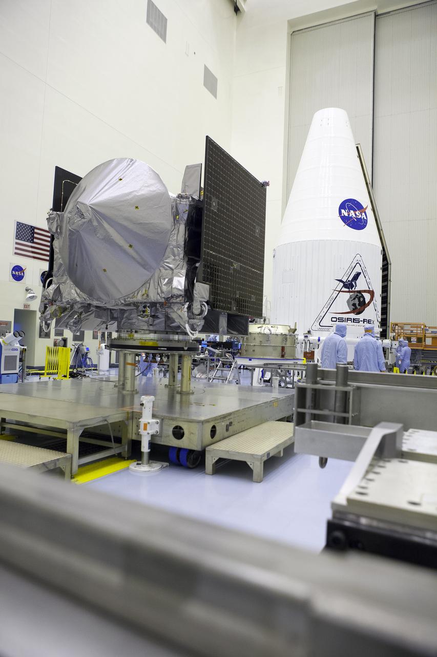 Inside the Payload Hazardous Servicing Facility at NASA's Kennedy Space Center in Florida, the agency’s Origins, Spectral Interpretation, Resource Identification, Security-Regolith Explorer, or OSIRIS-REx spacecraft is prepared for encapsulation in its payload fairing. Targeted for liftoff Sept. 8, 2016, OSIRIS-Rex will be the first U.S. mission to sample an asteroid, retrieve at least two ounces of surface material and return it to Earth for study. The asteroid, Bennu, may hold clues to the origin of the solar system and the source of water and organic molecules found on Earth.