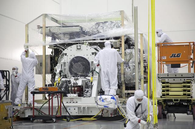 NASA image: GOES-R Uncrating and Move to Vertical