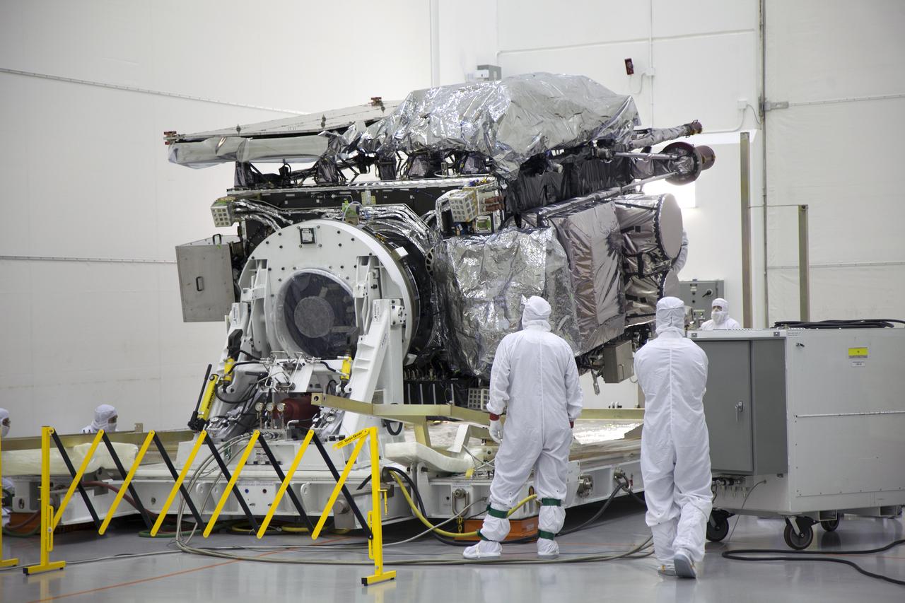 Team members monitor progress as the GOES-R spacecraft is lifted from horizontal to vertical inside the Astrotech payload processing facility in Titusville, Florida near NASA’s Kennedy Space Center. GOES-R will be the first satellite in a series of next-generation NOAA Geostationary Operational Environmental Satellites. The spacecraft is to launch aboard a United Launch Alliance Atlas V rocket in November.