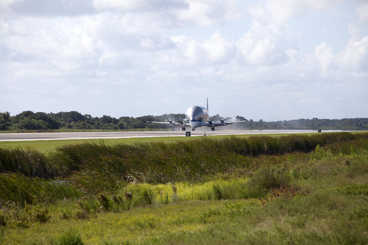 NASA’s Super Guppy aircraft touches down at the Shuttle Landing Facility, managed and operated by Space Florida, at the agency’s Kennedy Space Center in Florida, carrying the heat shield for Exploration Mission 1 (EM-1). The heat shield will be offloaded and transported to the Neil Armstrong Operations and Checkout Building high bay for processing. The heat shield arrived from manufacturer Lockheed Martin in Denver. The Orion spacecraft will launch atop NASA’s Space Launch System rocket on EM-1, an uncrewed test flight, in 2018.