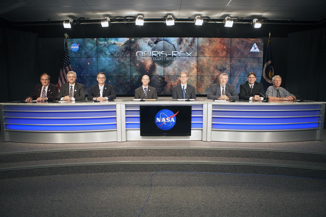 In the Kennedy Space Center’s Press Site auditorium, NASA and industry leaders speak to members of the media at a prelaunch news conference for the agency’s Origins, Spectral Interpretation, Resource Identification, Security-Regolith Explorer, or OSIRIS-REx spacecraft. From left are: George Diller of NASA Communications; Geoffrey Yoder, acting associate administrator of NASA’s Science Mission Directorate in Washington; Dante Lauretta, OSIRIS-REx principal investigator at the University of Arizona, Tucson; Tim Dunn, NASA launch manager at Kennedy; Scott Messer, program manager for NASA missions at United Launch Alliance in Centennial, Colorado; Michael Donnelly, OSIRIS-REx project manager at NASA’s Goddard Space Flight Center in Greenbelt, Maryland; Rich Kuhns, OSIRIS-REx program manager for Lockheed Martin Space Systems in Denver; and Clay Flinn, launch weather officer for the 45th Weather Squadron at Cape Canaveral Air Force Station, Florida.