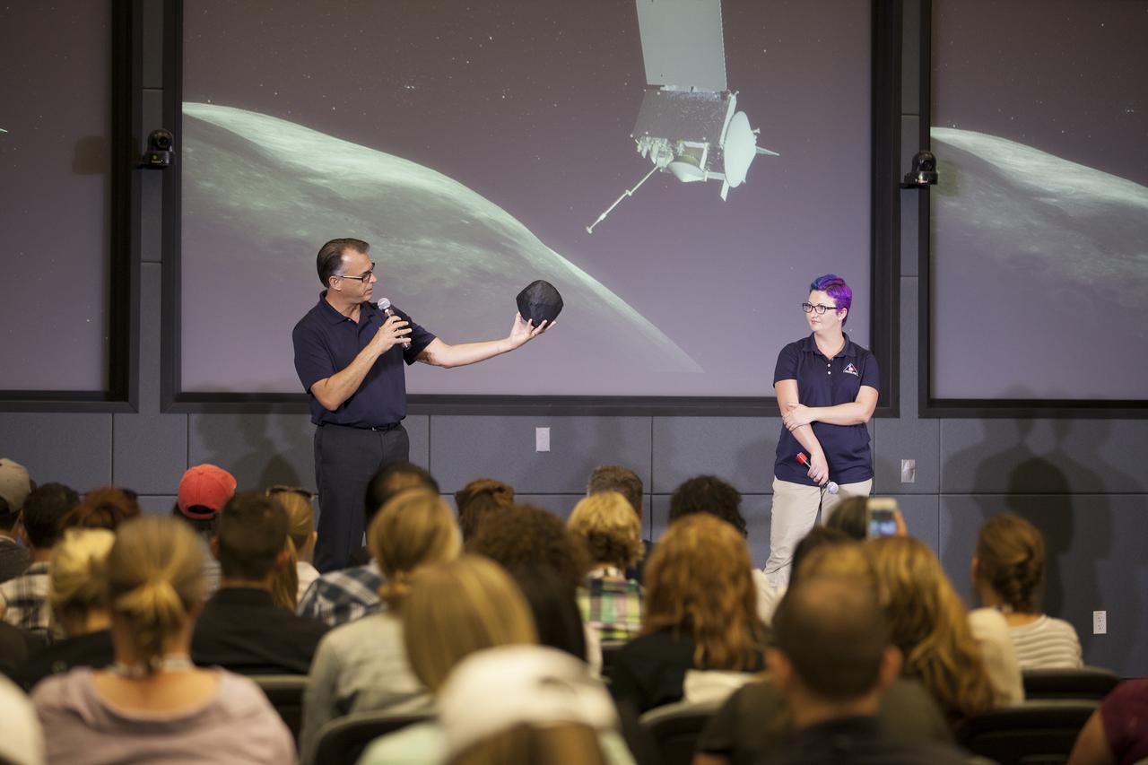 Social media followers were briefed by NASA scientists on asteroids, how they relate to the origins of our solar system and the search for life beyond Earth, during a NASA Social presentation in the Operations Support Building II at the agency’s Kennedy Space Center in Florida. The presentation took place before launch of the agency’s Origins, Spectral Interpretation, Resource Identification, Security-Regolith Explorer, or OSIRIS-REx spacecraft. From the left, are Dante Lauretta, OSIRIS-REx principal investigator from the University of Arizona at Tucson, and Christina Richey, OSIRIS-REx deputy program scientists at NASA Headquarters in Washington.